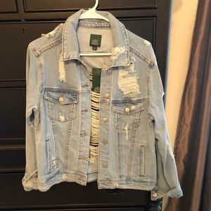 Distressed blue jean jacket